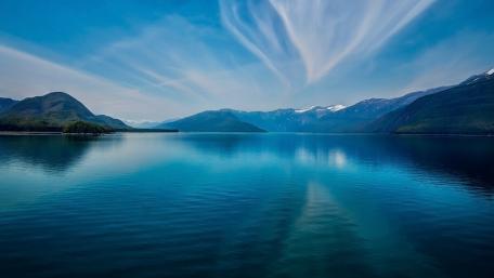 Serene Reflections on a Tranquil Lake wallpaper