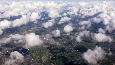 Vast Landscapes Under a Blanket of Clouds wallpaper