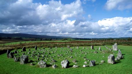 Ancient Stones Beneath Expansive Skies wallpaper