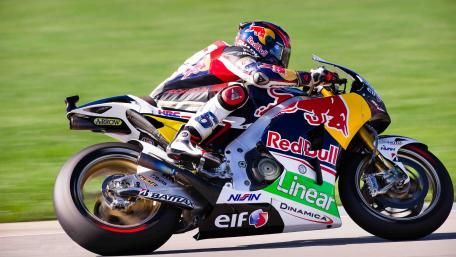 Dynamic Motorcycle Racer on the Track wallpaper
