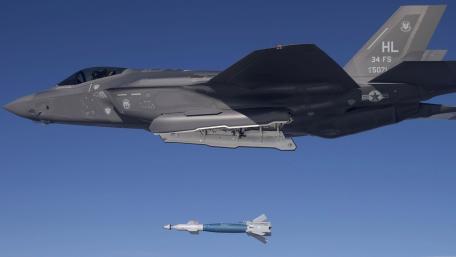 Futuristic Fighter Jet in Action wallpaper