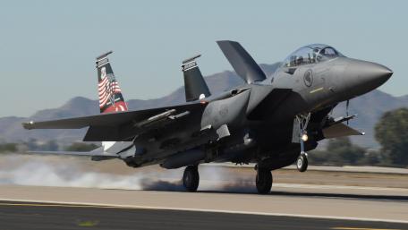 Fighter Jet Taking Off in Stunning Action Shot wallpaper