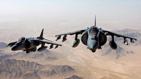 Fighter Jets in Dynamic Flight Formation wallpaper