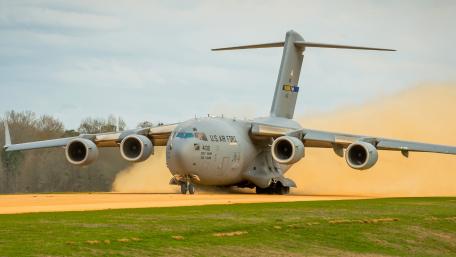 Powerful Military Transport Aircraft in Action wallpaper