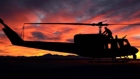 Sunset Helicopter Silhouette Overview of Military Operations wallpaper