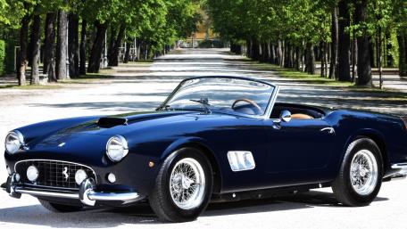 Classic Blue Convertible Beauty in Nature's Embrace wallpaper