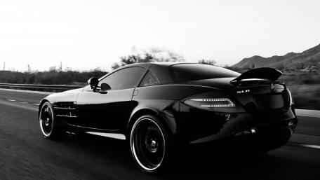Sleek Black Mercedes SLR on the Road wallpaper