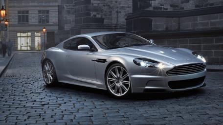 Sleek Silver Sports Car in Urban Setting wallpaper