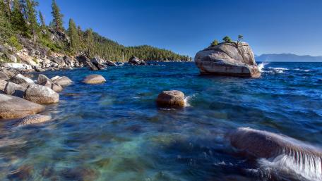 Tranquil Waters and Scenic Shores of Nature's Beauty wallpaper