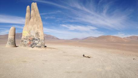 Majestic Desert Landscape with Unique Rock Formation wallpaper
