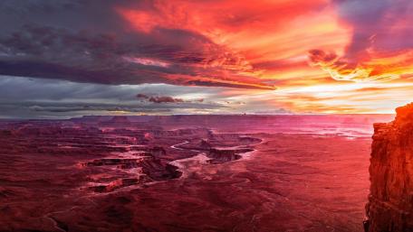Vibrant Sunset Over Majestic Canyon Landscape wallpaper