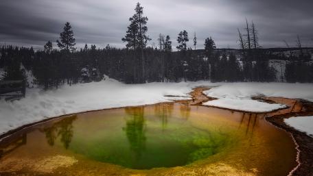 Mystical Hot Spring in a Winter Landscape wallpaper