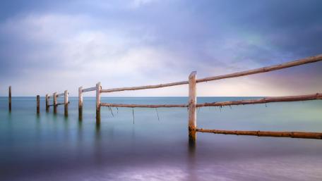 Serene Waters with Weathered Fence wallpaper