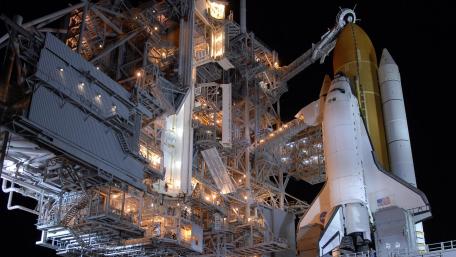 Majestic Launch Pad Under Starlit Sky wallpaper