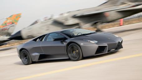 Sleek and Powerful Supercar in Motion wallpaper