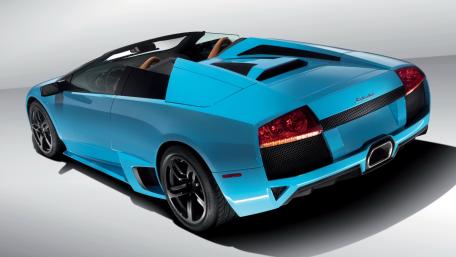 Vibrant Blue Luxury Sports Car Wallpaper wallpaper