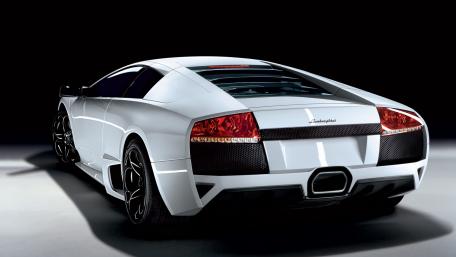 Sleek White Lamborghini at Night wallpaper