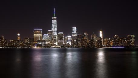 Stunning Night Skyline of a Vibrant Cityscape wallpaper