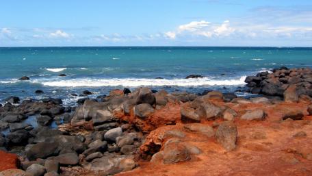 Serene Coastal View with Rocky Shoreline wallpaper