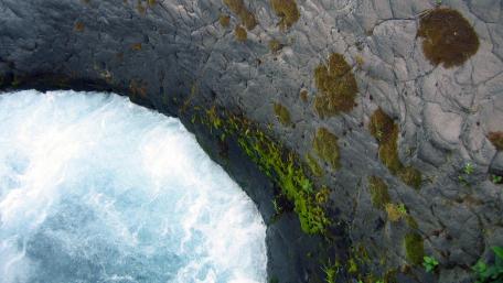 Serene Waters and Rocky Textures of Nature wallpaper
