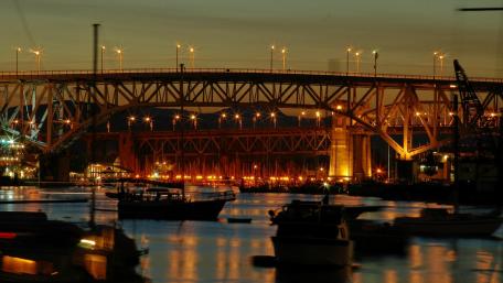 Urban Night Lights Reflected in Water wallpaper