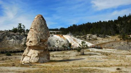 Majestic Yellowstone Landscape with Unique Rock Formation     wallpaper