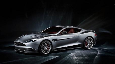 Sleek Silver Aston Martin on Dark Background wallpaper