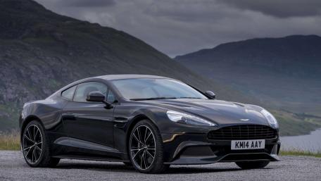 Sleek Aston Martin in Scenic Landscape wallpaper