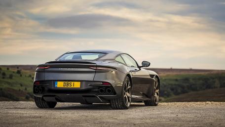 Sleek Aston Martin DBS on a Scenic Horizon wallpaper