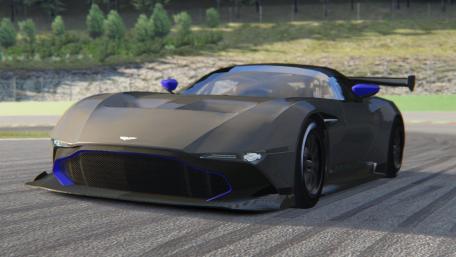 Sleek Aston Martin Race Car on Track wallpaper