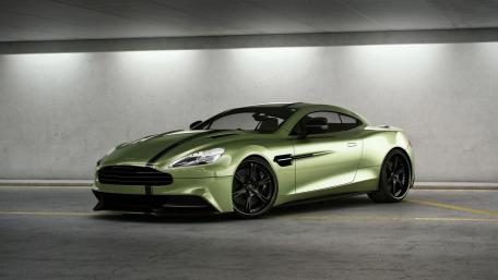 Sleek Green Sports Car in Urban Garage Scene wallpaper