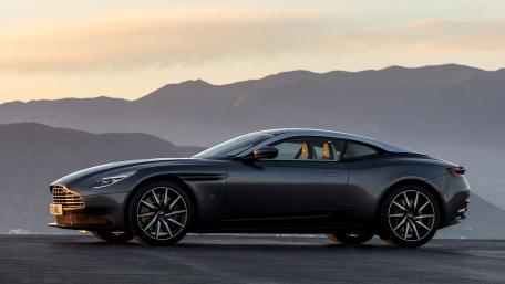 Sleek Aston Martin Under Sunset Glow wallpaper