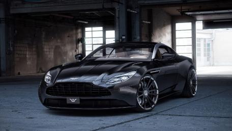 Sleek Black Beauty in an Urban Setting wallpaper