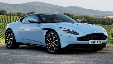 Sleek Aston Martin in Scenic Vineyard Setting wallpaper