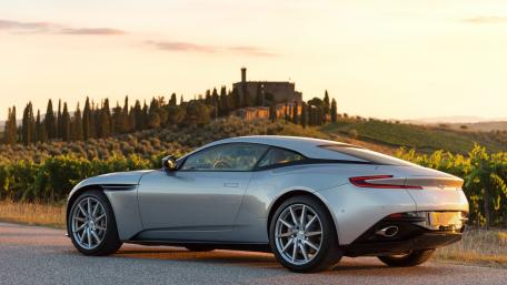 Sleek Silver Sports Car at Sunset wallpaper