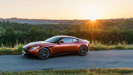 Stunning Sunset with a Luxury Car Scene wallpaper