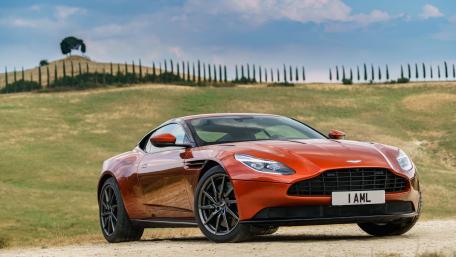 Sleek Aston Martin on Scenic Landscape wallpaper