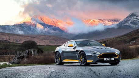 Stunning Mountain Drive with Luxury Car wallpaper