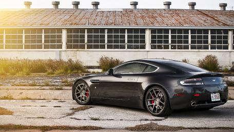 Sleek Aston Martin in Urban Decay wallpaper