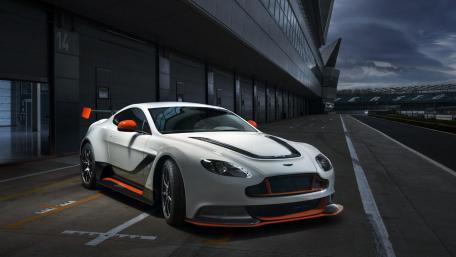 Sleek Racing Aston Martin on the Track wallpaper