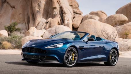 Sleek Convertible Captured in Nature's Embrace wallpaper