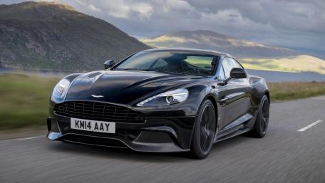 Sleek Aston Martin on a Scenic Drive wallpaper