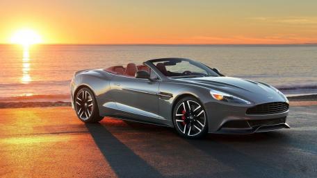 Sleek Convertible Under a Sunset Sky wallpaper