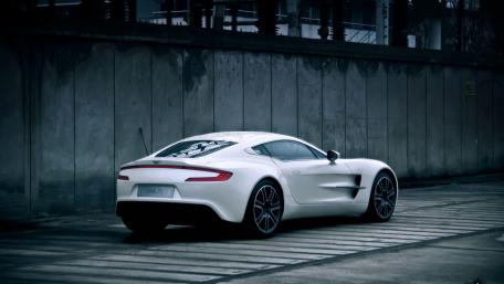 Sleek White Sports Car in Urban Setting wallpaper