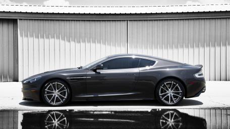 Sleek Gray Luxury Sports Car Wallpaper wallpaper