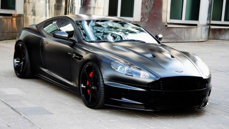 Sleek Black Aston Martin Sports Car Wallpaper wallpaper