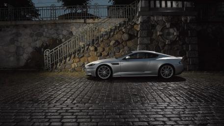 Sleek Silver Sports Car in Urban Setting wallpaper