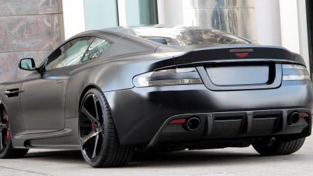 Sleek Black Aston Martin Rear View Design wallpaper