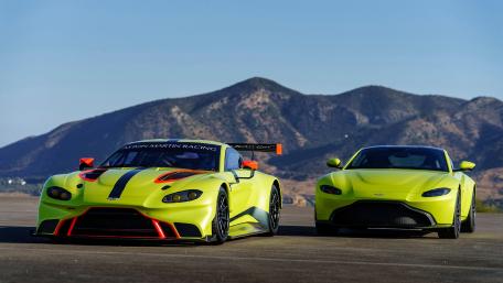 Vibrant Aston Martin Racing Duo wallpaper
