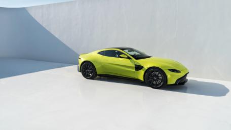 Sleek Lime Green Sports Car Wallpaper wallpaper